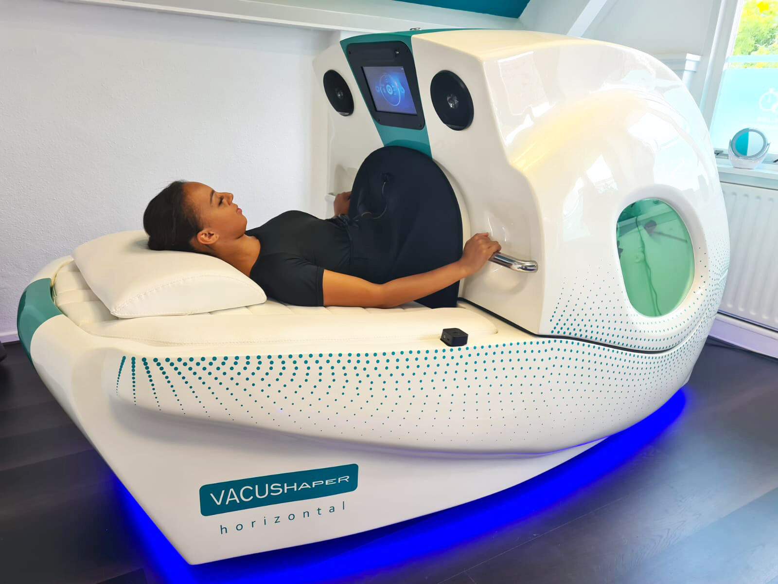 Liggende training in de horizontale VacuShaper bij Body Shape & Beauty